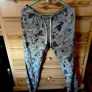 Cats wrapped up in Christmas lights